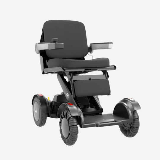 front view of black electric wheelchair with 4 wheels and cushions 